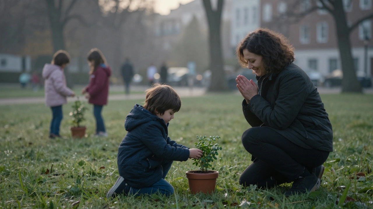 A child watering a plant in a park at dawn, watched by a caring adult.